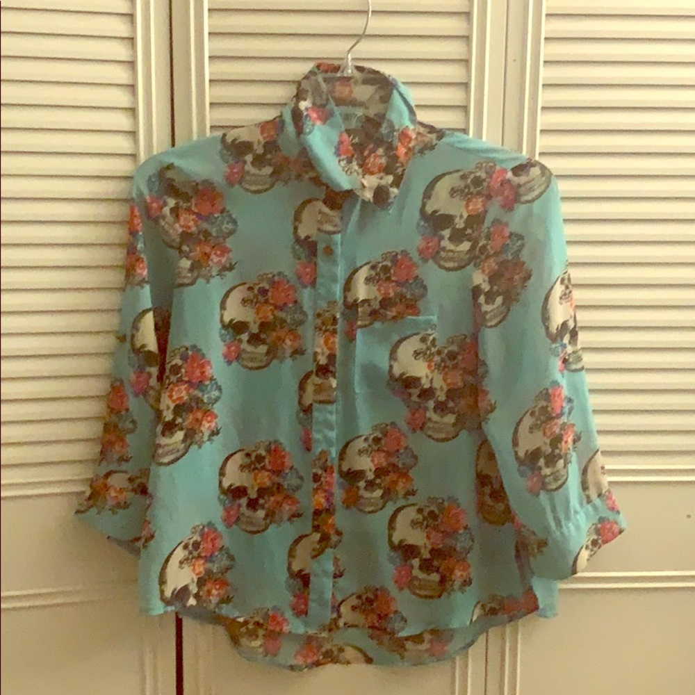 A designed buttoned up blouse.